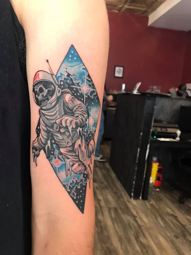 Explore dragon tattoo ideas for ladies, creative tattoo ideas in Jonesboro, available at Gallery Of Ink Tattoo Shop