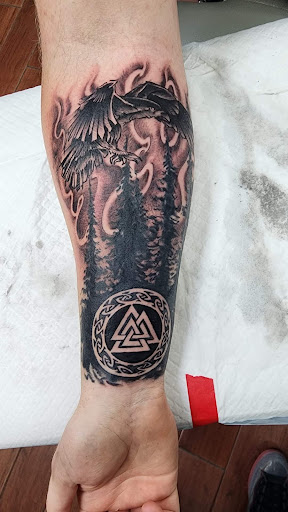 Explore softball tattoo ideas, creative tattoo ideas in Toledo, available at 4 Nineteen Ink