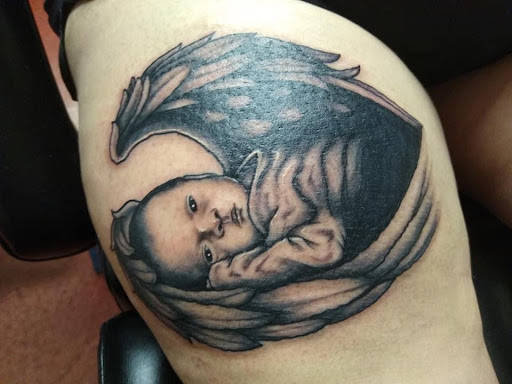 Explore cupcake tattoo ideas, creative tattoo ideas in Council Bluffs, available at Crimson City Tattoo