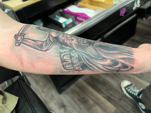 Explore mens daughter tattoo ideas, creative tattoo ideas in Clarksville, available at Love Blood Ink Tattoo