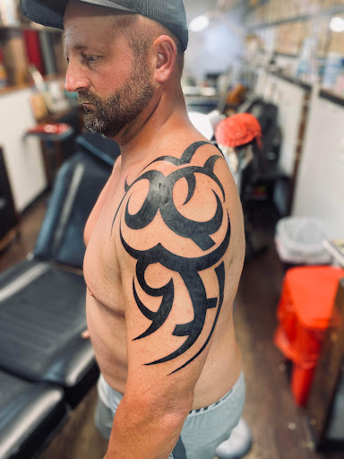 Explore dogwood tree tattoo ideas, creative tattoo ideas in Ocala, available at Beauty in a Canvas Tattoo and Art Gallery