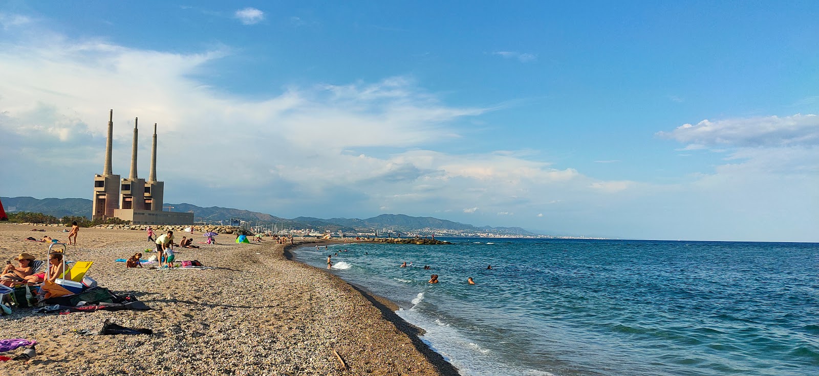 Photo of Platja del Forum with brown shell sand surface