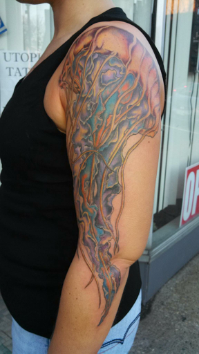 Explore tooled leather tattoo ideas, creative tattoo ideas in Alfred, available at Utopian tattoo and body piercing