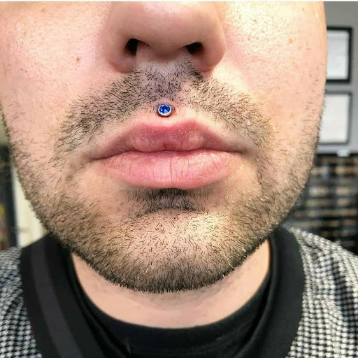 Explore from blood and ash tattoo ideas, creative tattoo ideas in Summerville, available at Exotic Impressions Body Piercing