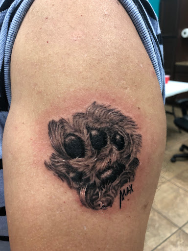 Explore pansy tattoo ideas, creative tattoo ideas in Fort Myers, available at Laid Back Tattoo