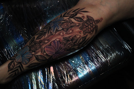 Explore earlobe tattoo ideas, creative tattoo ideas in Homosassa, available at Citrus Tattoos