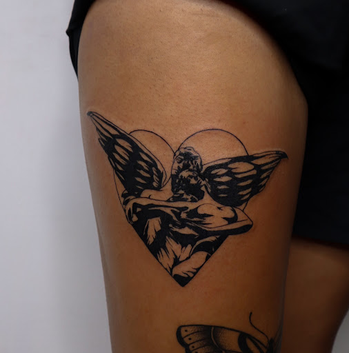 Explore angel neck tattoo ideas, creative tattoo ideas in San Diego, available at Nothing Sacred Tattoo
