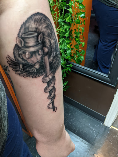 Explore october birth tattoo ideas, creative tattoo ideas in Overland Park, available at Aftershock Tattoo Co.