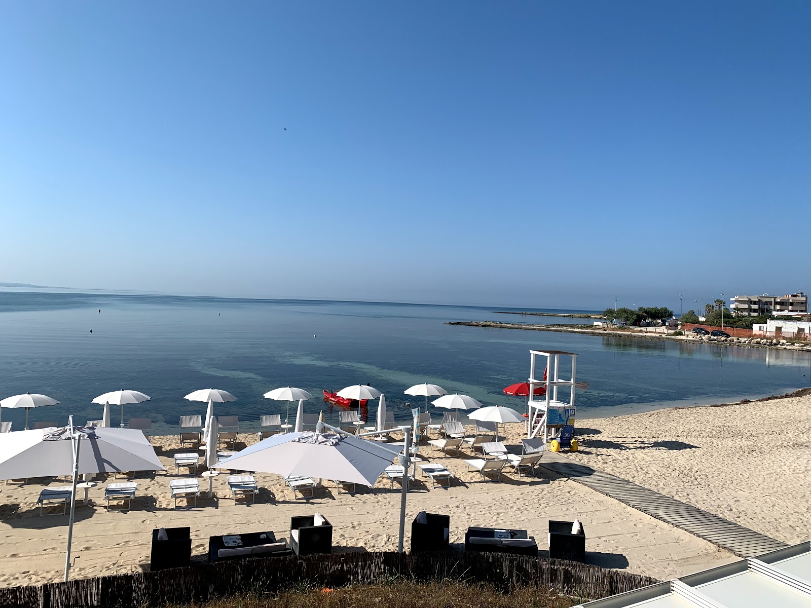 Foto de Spiaggia Porto Cesareo con parcialmente limpio nivel de limpieza