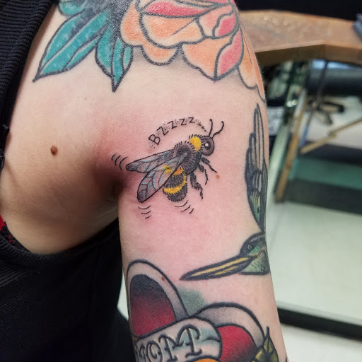 Explore back ear tattoo ideas, creative tattoo ideas in Wilmington, available at Jade Monkey Tattoo