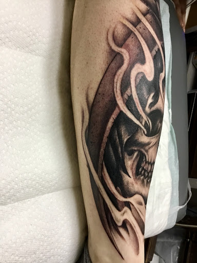 Explore neck tattoo idea, creative tattoo ideas in Peoria, available at Big Top Tat2