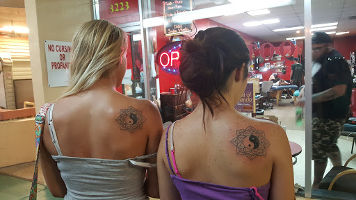 Tattoo Shop «Divine Torture», reviews and photos, 3223 Curry Ford Rd, Orlando, FL 32806, USA