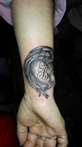 Explore pet memorial tattoo ideas, creative tattoo ideas in Los Angeles, available at South Central Tattoos