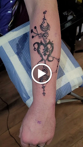 Explore tattoo ideas for men leg, creative tattoo ideas in Hillsboro, available at Reflections Art Gallery and Studio