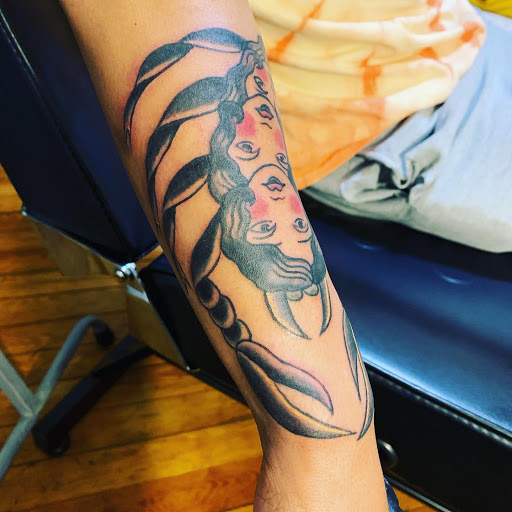 Explore lilac tattoo ideas, creative tattoo ideas in Greensboro, available at Opalus Tattoo