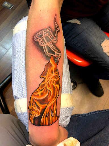 Explore half sleeve tribal tattoo ideas, creative tattoo ideas in Shreveport, available at Red Handed Tattoo