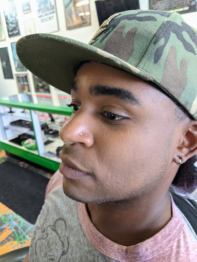 Explore cool hand tattoo ideas, creative tattoo ideas in Redding, available at Caddy Daddys