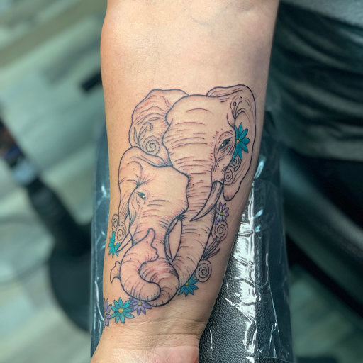 Explore anime forearm tattoo ideas, creative tattoo ideas in Ocala, available at The Tattoo Gallery of Ocala LLC