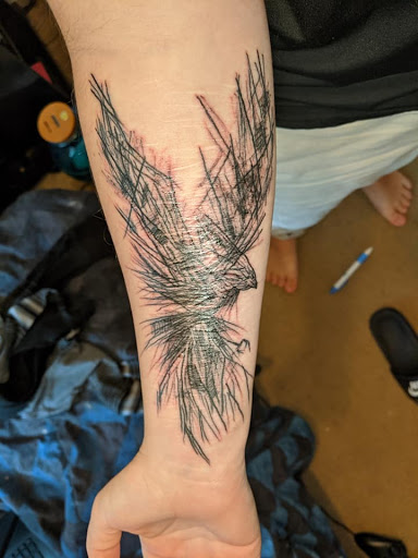 Explore spina bifida tattoo ideas, creative tattoo ideas in Myrtle Beach, available at Elite Ink Tattoos of Myrtle Beach