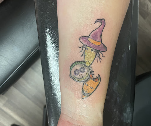 Explore bookish tattoo ideas, creative tattoo ideas in Saint Marys, available at Empire Tattoo