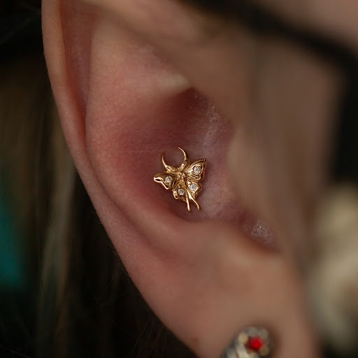 Explore women's quarter sleeve tattoo ideas, creative tattoo ideas in Boston, available at Arcadia Body Piercing