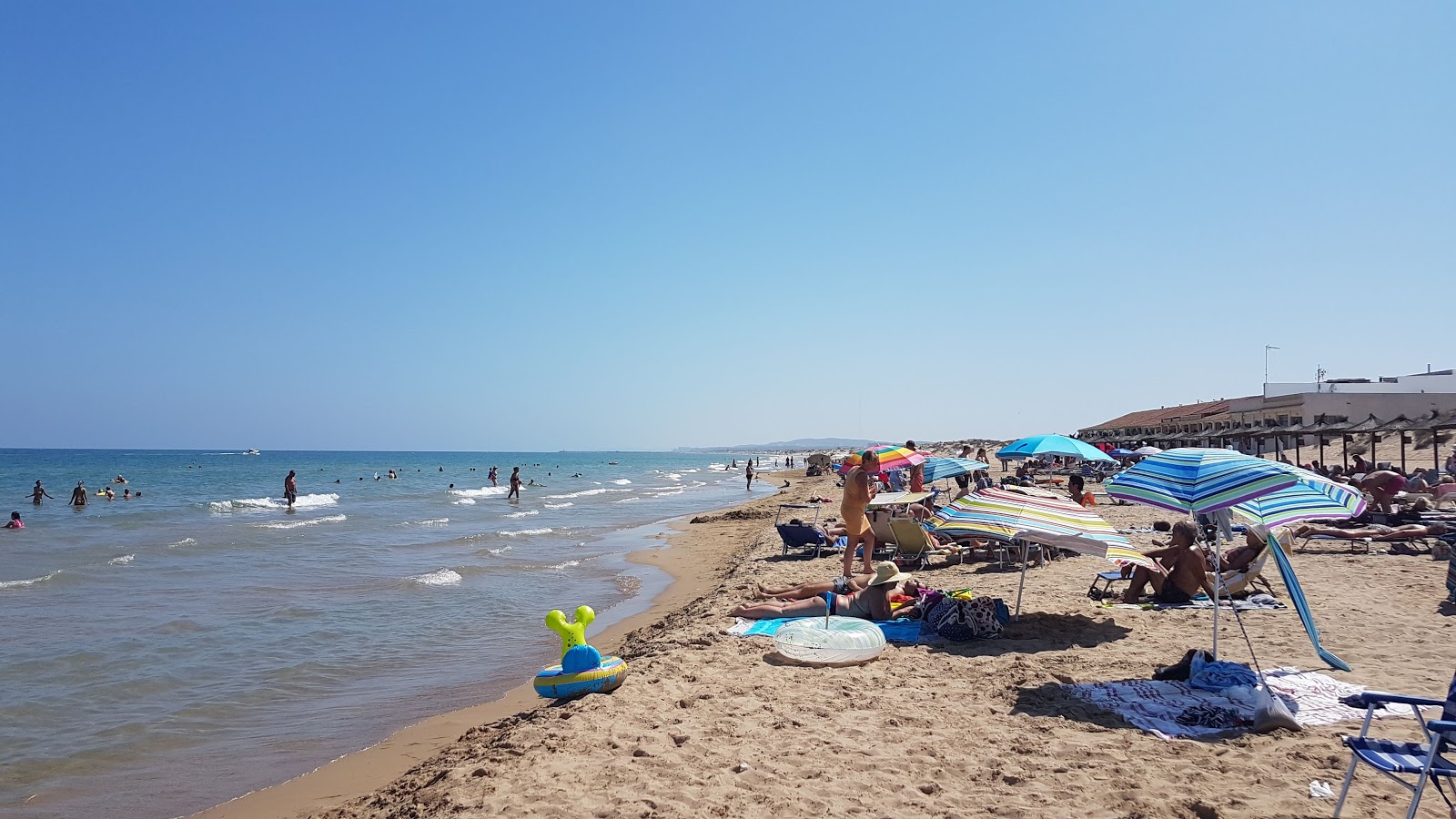 Playa de la Marina'in fotoğrafı düz ve uzun ile birlikte