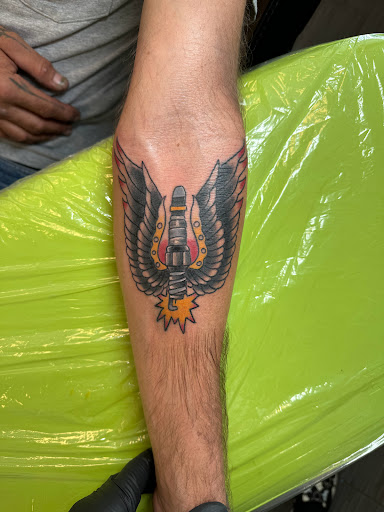 Explore thyroid cancer tattoo ideas, creative tattoo ideas in Palm Harbor, available at Angry Owl Tattoo and Piercing