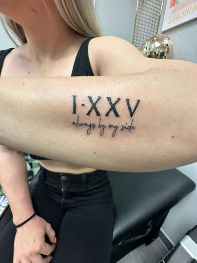 Explore dad and daughter tattoo ideas, creative tattoo ideas in Peoria, available at The Ink Bar