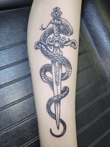 Explore tattoo sleeve ideas music, creative tattoo ideas in Angola, available at Hoodlum Ink