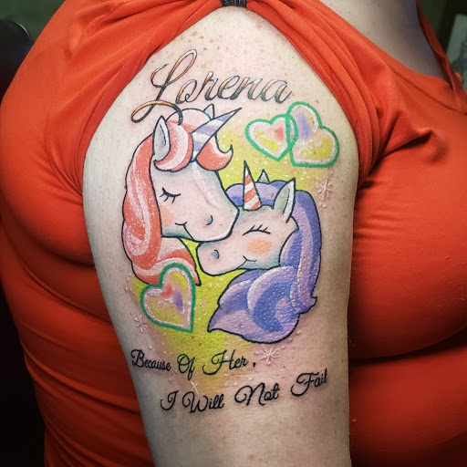 Explore red hand tattoo ideas, creative tattoo ideas in Lagrangeville, available at Black Cherry Tattoo Studio NY