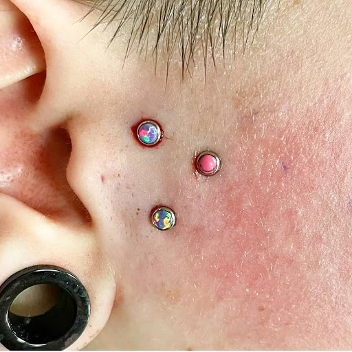 Explore romans 8 18 tattoo ideas, creative tattoo ideas in Summerville, available at Exotic Impressions Body Piercing