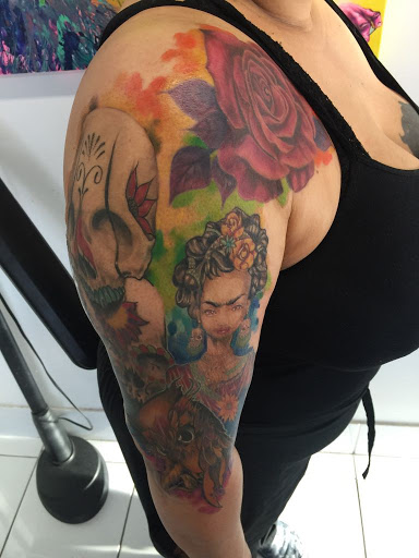 Explore male rib tattoo ideas, creative tattoo ideas in Duluth, available at Tattoo Fiesta