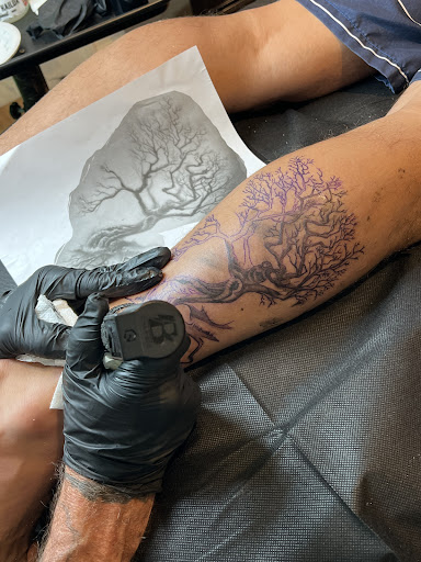 Explore family tree tattoo ideas for females, creative tattoo ideas in Honolulu, available at Aloha Tattoo Waikiki Hilton Hawaiian Village Rainbow Bazaar
