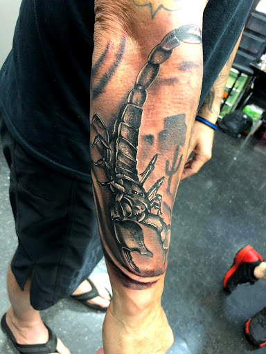 Explore female tattoo ideas for lower back, creative tattoo ideas in Westland, available at Skin Sinn tattoos