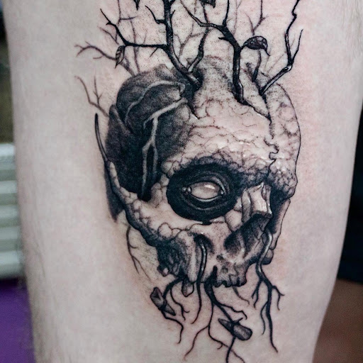 Explore mid arm tattoo ideas, creative tattoo ideas in Savannah, available at Tramp Art Studios