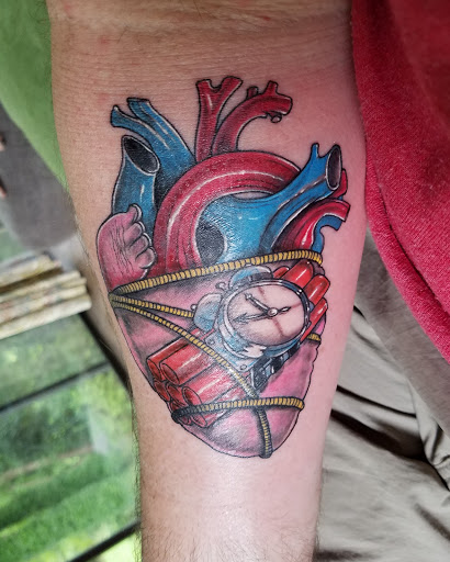 Explore mental health ribbon tattoo ideas, creative tattoo ideas in Daytona Beach, available at Studio 21 Tattoo & Piercings Daytona Beach