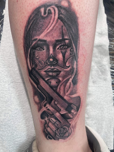 Explore tattoo ideas for back of leg, creative tattoo ideas in Muscatine, available at True Art Tattoo Studio of Muscatine