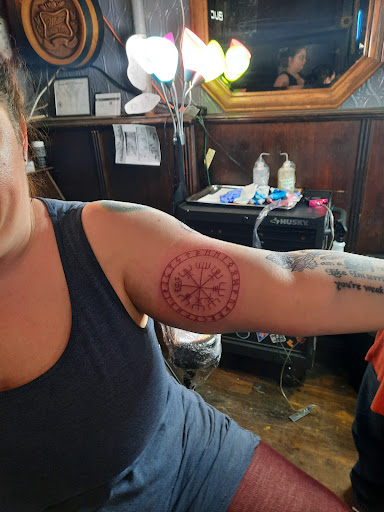 Explore flower tattoo ideas for men, creative tattoo ideas in Ashland, available at Time Warp Tattoos