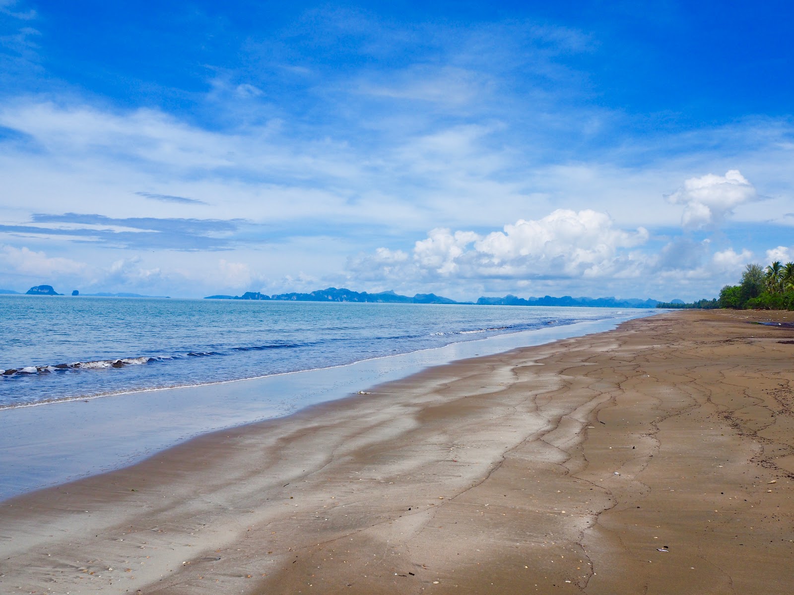 Photo of Long Beach with turquoise pure water surface