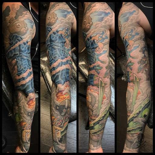 Explore bomb tattoo ideas, creative tattoo ideas in Addison, available at Cat Tattoo