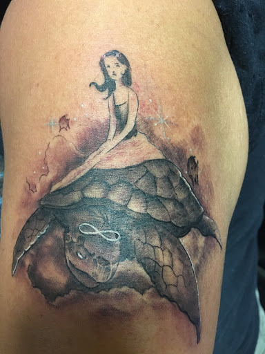 Explore bodybuilding tattoo ideas, creative tattoo ideas in Savannah, available at Tatlyfe Studios