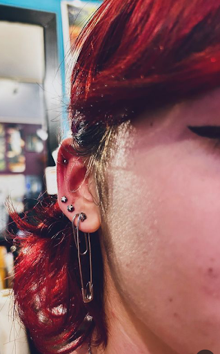 Find owl tattoo ideas for guys for your next unique tattoo in Pahoa at Electric Jungle Tattoo