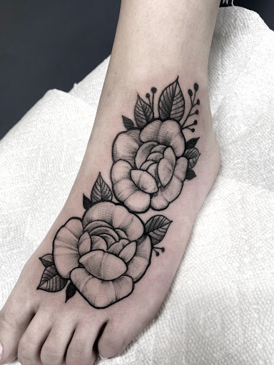 Explore ear tattoo ideas for females, creative tattoo ideas in Orange, available at North Quabbin Tattoo