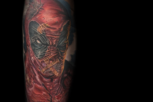 Explore ski tattoo ideas, creative tattoo ideas in Davenport, available at Ynot Ink Studio