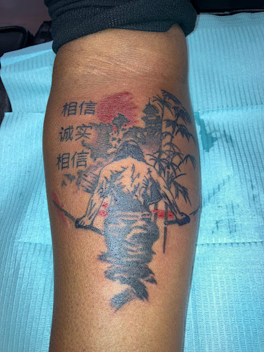 Explore alice in wonderland tattoos ideas, creative tattoo ideas in Kewanee, available at Splat Ink tattoos and piercings