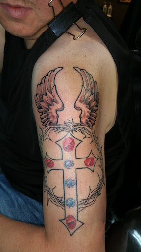 Explore big tattoo ideas for women, creative tattoo ideas in Foley, available at Black Sheep Custom Tattoos and Piercings