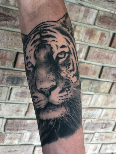 Explore small back tattoo ideas, creative tattoo ideas in Tallmadge, available at Killjoy tattoo