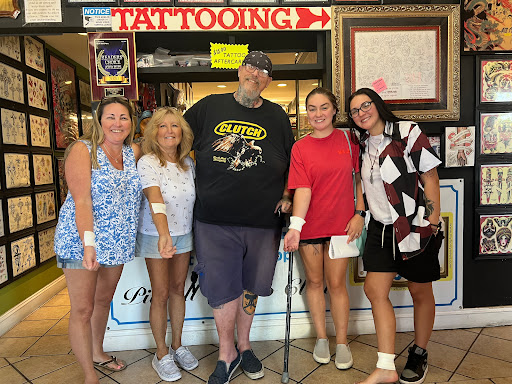 Explore cross tattoo ideas for woman, creative tattoo ideas in Myrtle Beach, available at Pitbull Tattoo and Piercing Clinic