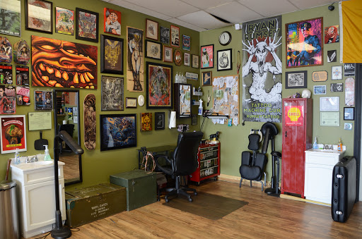 Tattoo Shop «Tattoo Machine Gun- Clark», reviews and photos, 1705 Charlestown New Albany Rd a, Jeffersonville, IN 47130, USA