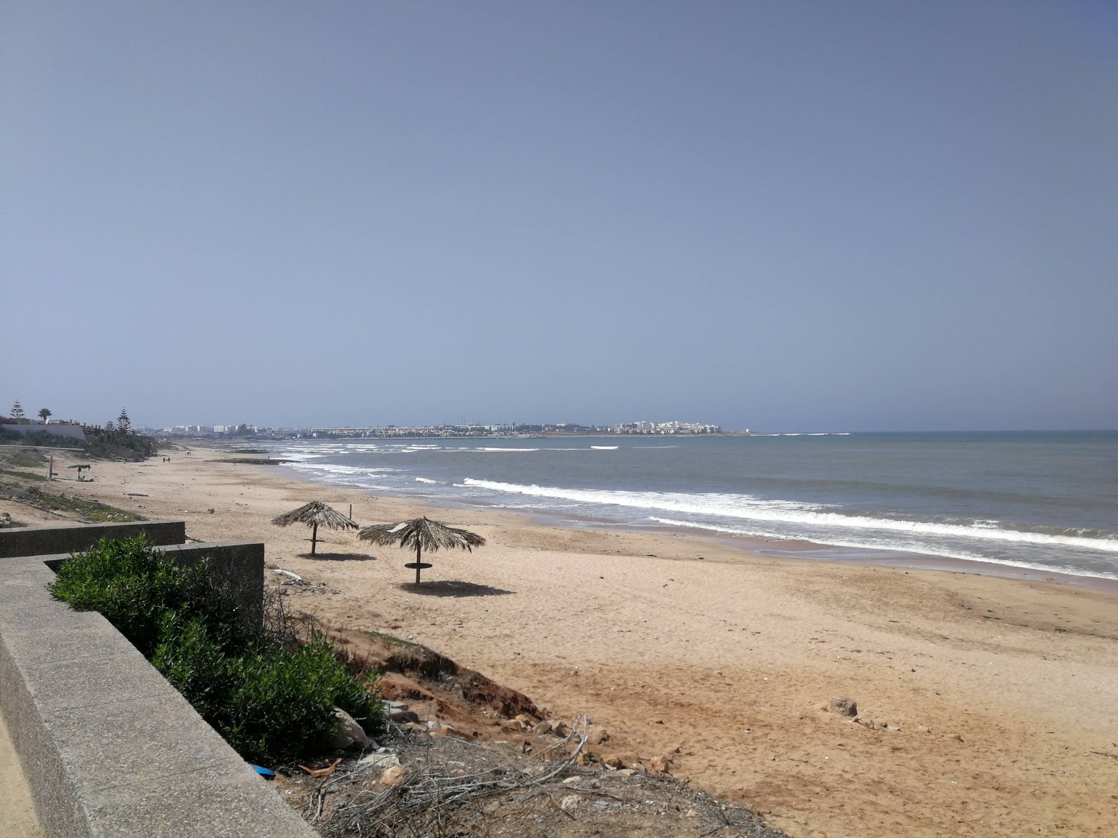 Foto av babaloo med lång rak strand